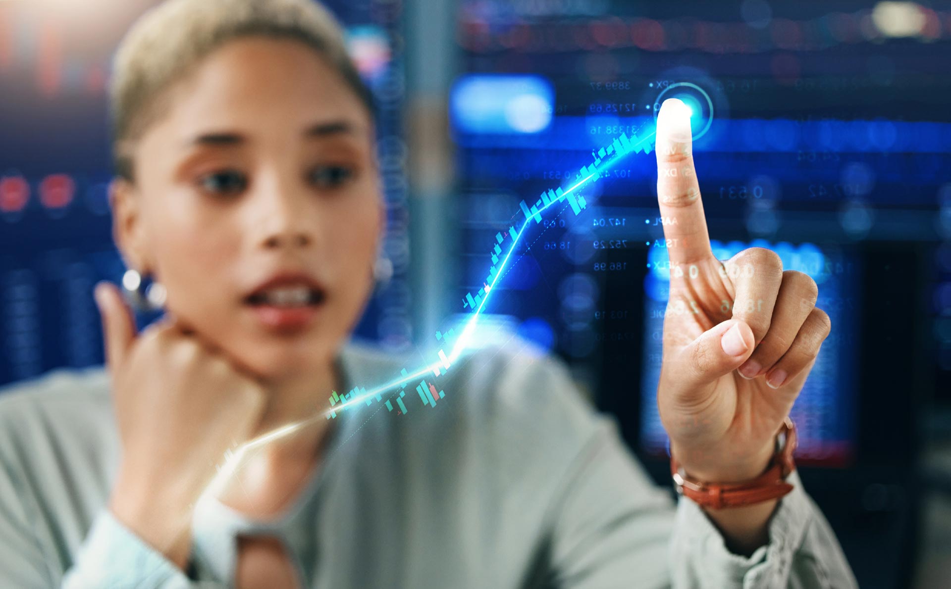 Person Working with Data Charts | Aluma Capital (Pty) Ltd